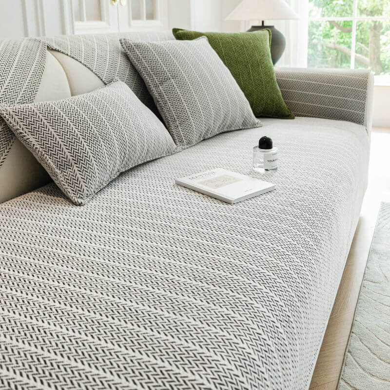 Chenille sofa cover with non-slip design, ideal for pet owners, resistant to dog hair, easy to clean, and machine washable couch slipcover. 0